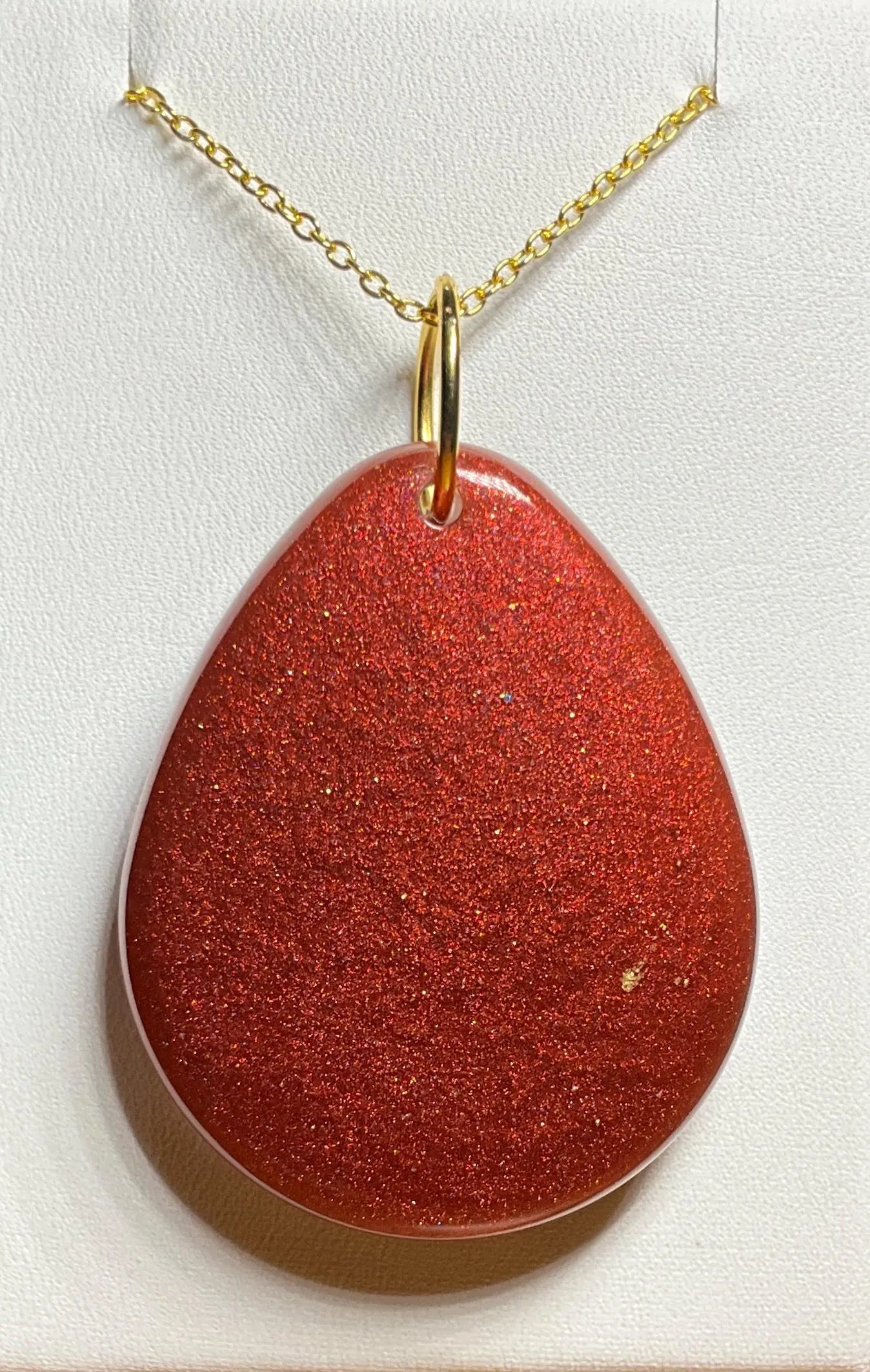 Bold Daisy Necklace โ Dual Sided Pendant with Red and Gold